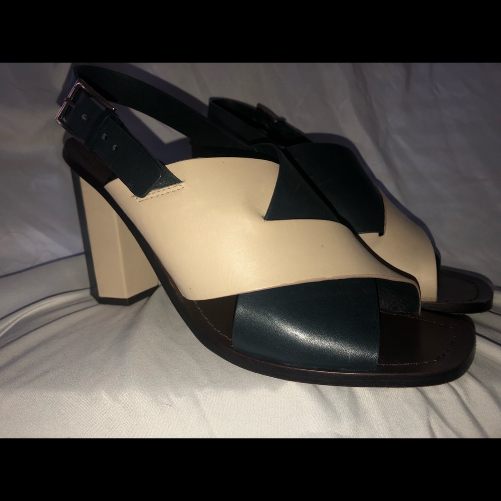 Blue and cream Tory Burch heels .